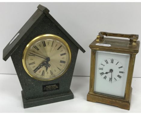 An early 20th Century French brass cased carriage clock, the white enamelled dial with Roman numerals to the chapter ring, 8 