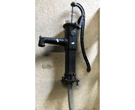 A painted cast iron pump, various wooden handled garden tools, a collection of garden sprayers, a vintage garden / greenhouse