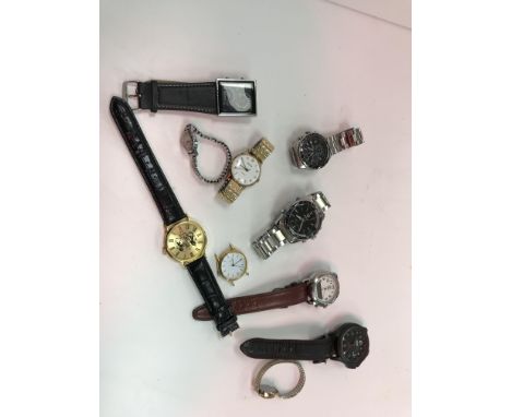 A collection of modern gentlemens wristwatches to include a Seiko chronograph 100 m wristwatch, a Shark sport watch, Shark ar