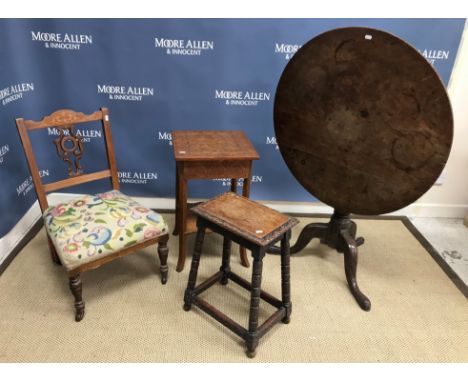 A George III mahogany tea table, the circular snap top on a baluster turned pedestal to cabriole tripod base, 80 cm diameter 