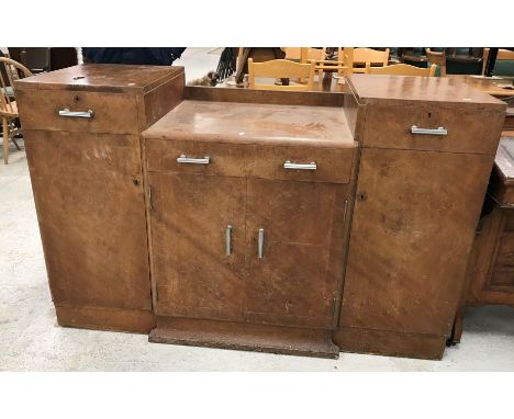 A mid 20th Century walnut sideboard in the Art Deco manner 153 cm wide x 60 cm deep x 98 cm high together with a similar set 