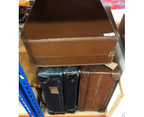 A collection of sundry items to include suitcases, cast iron fire basket, various clocks, wall mirror, fire screen etc