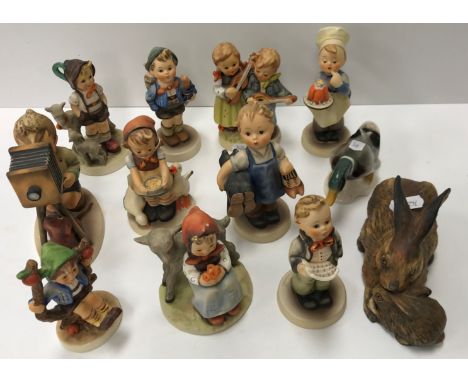 A collection of Goebal Hummel figures including "Happy days", "Home from market", "Soloist", "Baker", "Apple tree boy", "Good