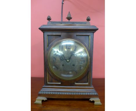A 19th Century mahogany bracket clock, with convex brass dial, the movement stamped M.B. P
