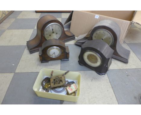 A Smiths Bakelite mantel clock, three other clocks and movement
