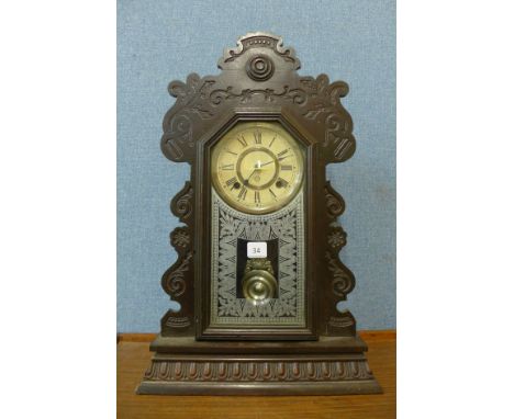 A 19th Century American Ansonia Series X 8-day gingerbread shelf clock