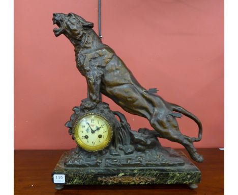 An early 20th Century French spelter figural lion mantel clock, on marble plinth