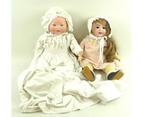 A K&K 58 bisque head doll, made in Germany, cloth body, composite lower limbs, sleep eyes with multi stroke eye brows and las