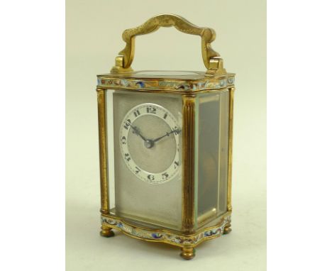 A French carriage clock enamelled in polychrome colours, circa 1910, with silvered face and chapter ring, 6.7 by 8.4 by 11.8c