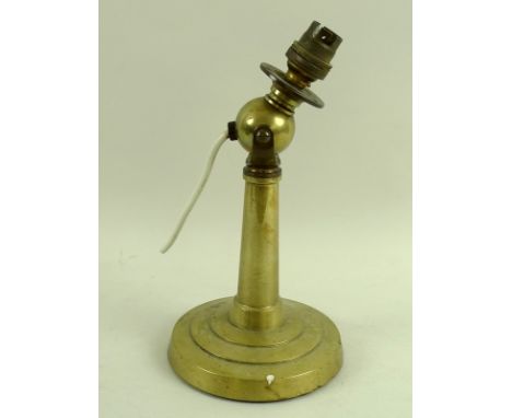 A brass swivel lamp base, made by engineers of the White Star Line Company for a cadet of the company and given as a gift, 14