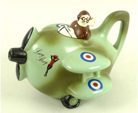 A Carltonware Lucy May teapot bi-plane with pilot lid, RAF roundels to the wings and Lucy May painted to the front, shape num
