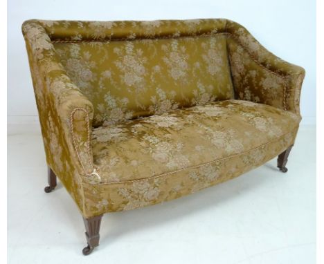 A Victorian two seater settee, with bolster top rail and shaped arms, bowed front and overstuffed seat, upholstered in olive 