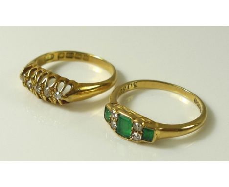 Two 18ct gold Edwardian rings, comprising an 18ct gold, emerald and diamond ring, marked 1916, size K, together with an 18ct 