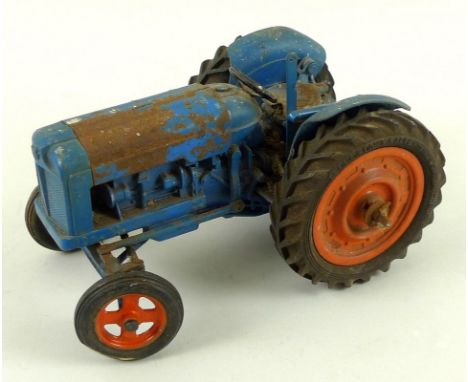 A collection of vintage 1950's die cast toys, comprising a Chad Valley Co Ltd Fordson Major Tractor, with royal blue painted 