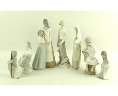 A group of Lladro bisque figurines, comprising a figurine modelled as Don Quixote, model no. 4854, 30cm,  a kneeling girl, 15