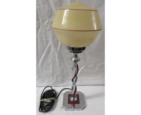 Art Deco style chromium table lamp with opaque glass shade with red line trim, the column with dual spiral twist of red and c