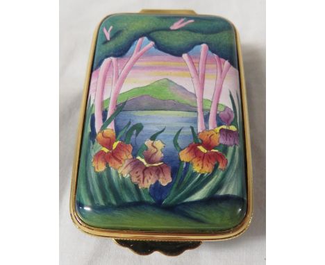 Moorcroft enamel oblong pill box with hinged lid, blue body, the lid painted with landscape and flowers, about 6cm x 4cm x 2.