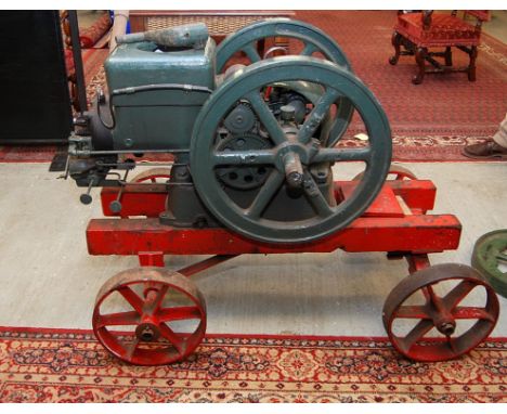 FAIRBANKS MORSE 3 1/2 HP STATIONARY ENGINE CURRENTLY IN RUNNING CONDITION ON METAL WHEELED TROLLEY 