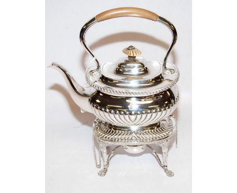 A SILVER SPIRIT KETTLE LONDON 1901 BY R & P FRUIT-WOOD HANDLES AND KNOP CLAW FOOT BEARING CREST OF STAR AND TURRET APPROX 127