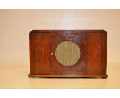 DECO MANTEL CLOCK IN SERPENTINE SHAPED WALNUT CASE AND EBONISED . QUALITY MOVEMENT, CHIMES ON THE HOUR AND HALF HOUR ON COILE