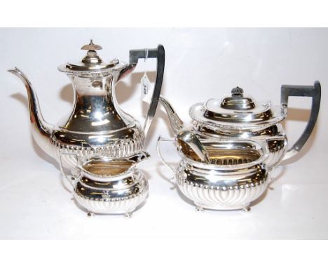 A FOUR PIECE SILVER TEASET SHEFFIELD CIRCA 1900 ALL BEARING CREST OF STAR AND TURRET - TEAPOT, COFFEE POT, SUGAR AND CREAM, P