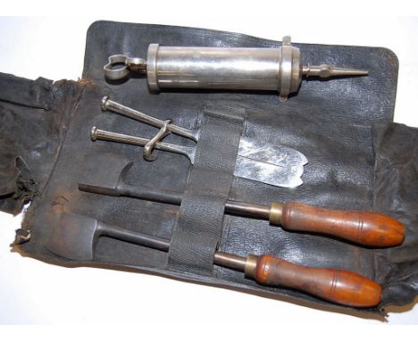 ARNOLD AND SON LONDON, VETS TOOLS, TONGS AND TWO WOODEN HANDLE "AXES" ALONG WITH A HEAVY DUTY METAL SYRINGE  