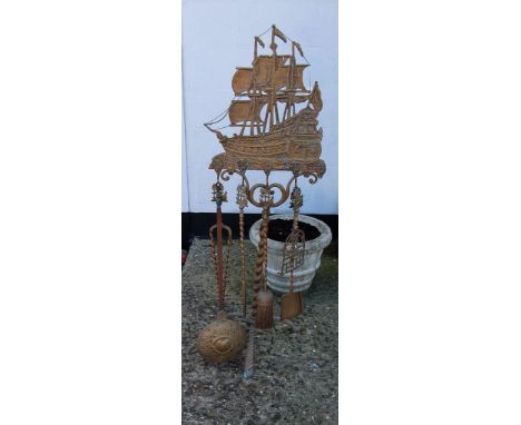 A LARGE ORNATE FIRE COMPANION SET WITH TALL SHIP DECORATION INCLUDING FIRE TOOLS AND CHESTNUT ROASTER, 130 CM TALL 