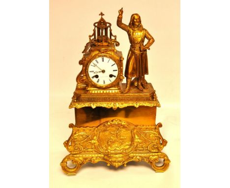 FRENCH GILT METAL MANTEL CLOCK WITH KNIGHT FIGURE THE ENAMELLED FACE MARKED LE ROY A PARIS, STRIKING ON A BELL, 48cm. KEY AND