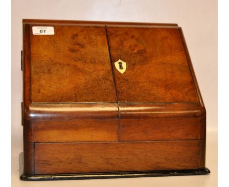 A VINTAGE WALNUT STATIONERY CABINET IN WALNUT, DRAWER, PEN TRAY WITH INK BOTTLE STORAGE AND TOP OPENING WITH COMPARTMENTS BEL