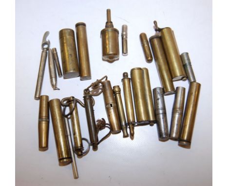 A COLLECTION OF BRASS AND METAL CANISTERS AND CONTAINERS AND THEIR CONTENTS INCLUDING NEEDLE CASES, SCREW DRIVERS, SPRING BAL