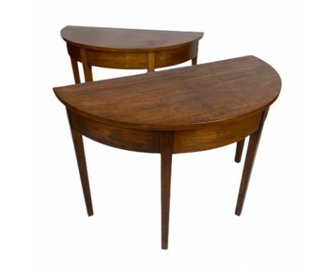 DEMI LUNE CONSOLE TABLES, a pair, 71cm H x 107cm W x 52cm D, George III mahogany. 