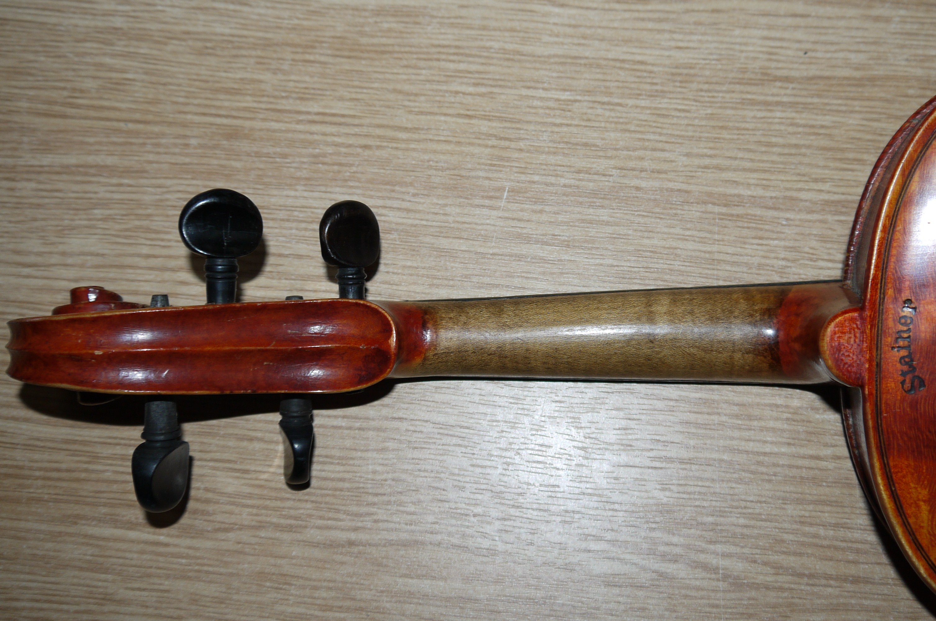 A 19th century violin with 2 piece back stamped 'Stainer', with label ...