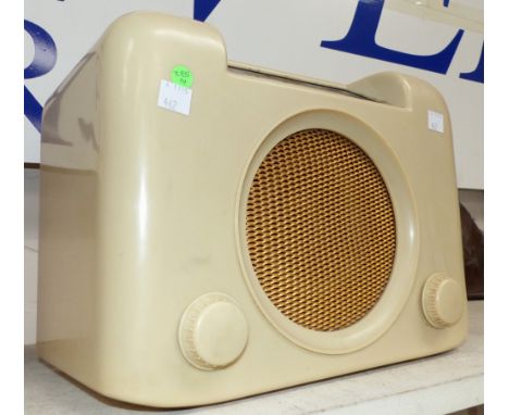 A vintage Bush radio in cream Bakelite case (sold as a collector’s item only)