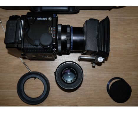 A Mamiya RZ67 ProII square format camera with 5 cassette backs, 90mm f3.5 and 150mm f3.5 lenses, chromatec bellows, customise