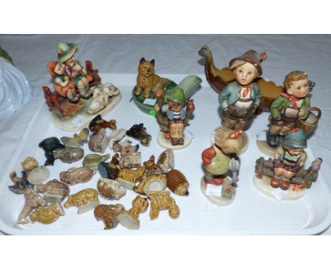 A Wade pipe stand; a Wade longboat and whimsies; 7 various Hummel figures