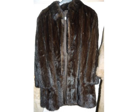 A three quarter length mink coat by Barry Whitby, Altrincham