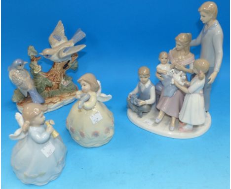 A Leonardo Collection family group of 2 birds and 2 girl angels playing instruments