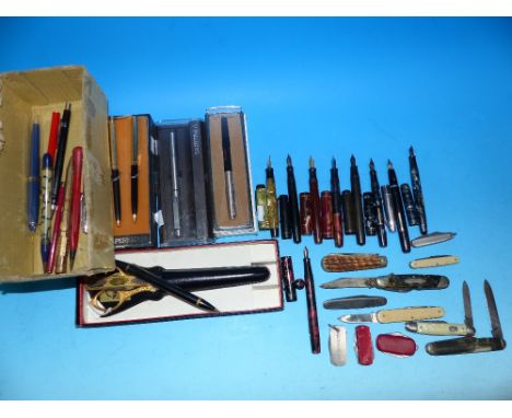 A selection of vintage pens; pen sets; penknives; etc.