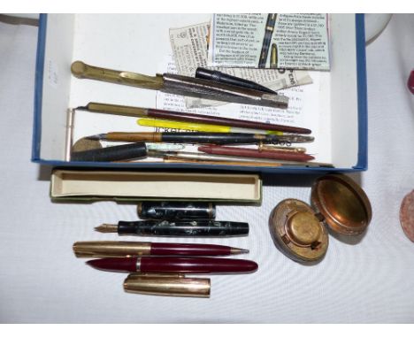 A 1960's Parker fountain pen and propelling pencil; a 19th century travelling inkwell; other pens and writing equipment