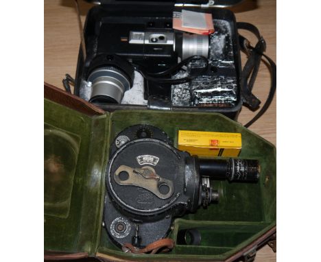 A Bell & Howell clockwork cine camera in fitted leather case; a John Player cine camera