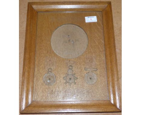 A polished light oak frame, craftsman made to contain a WWI trio and plaque group, c. 1920's
