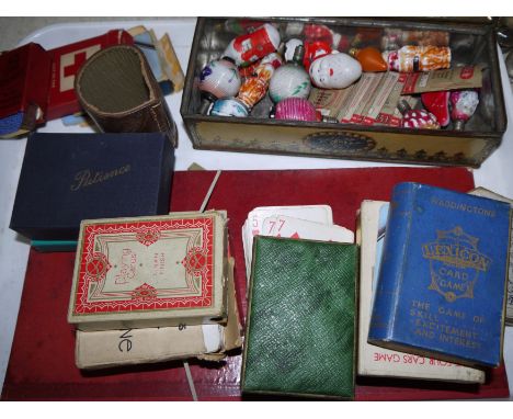 A selection of vintage cards; games and Christmas light bulbs