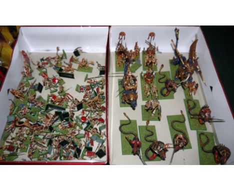 A selection of constructed and painted Warhammer Tomb Kings Army with some vehicles