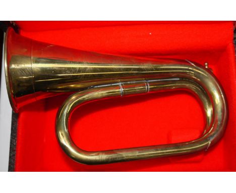 A brass military bugle by Barratts, cased (no mouthpiece)