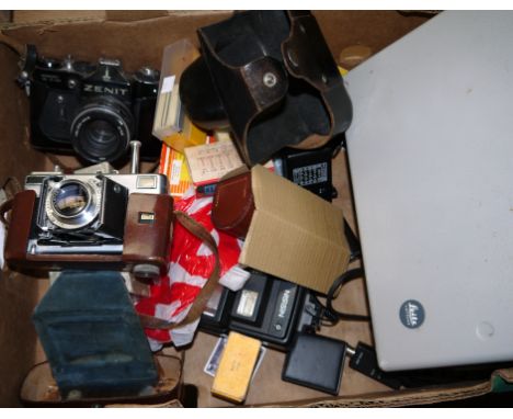 A Voigtlander Vitessa 35mm camera, A Zenit SLR camera, miscellaneous items