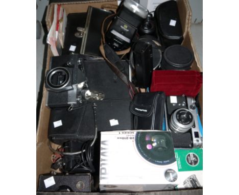 A Zorki -6 camera and a selection of other cameras and lenses