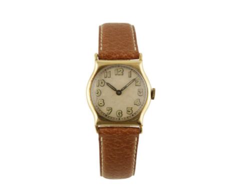 9CT GOLD CUSHION CASE GENTLEMAN'S WRIST WATCH with manual wind movement, silver dial, Arabic numerals on brown leather strap,