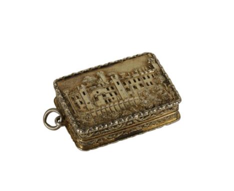 WILLIAM IV SILVER GILT CASTLE-TOP VINAIGRETTE by Nathaniel Mills, Birmingham, 1838, of rectangular form, the cover depicting 