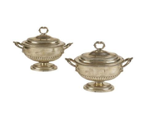 PAIR OF GEORGE III SILVER SAUCE TUREENS AND COVERS by Paul Storr, London 1810, of oval form, the detachable covers with reede