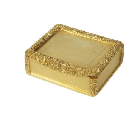 A VICTORIAN SILVER GILT SNUFF BOX by Barney Barnet, Birmingham, 1881, rectangular form, the hinged top with foliate borders i